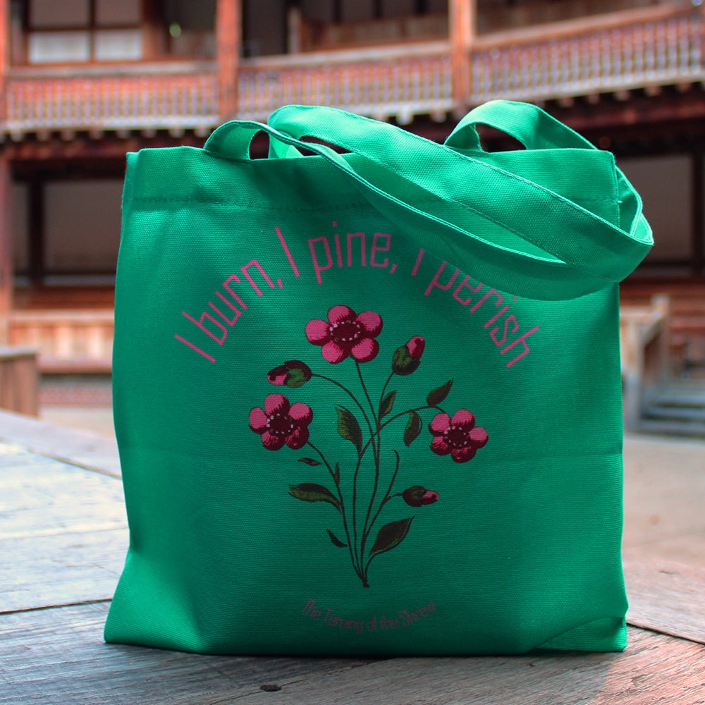 
                      
                        Teal book bag with pink writing and pink centred flowers
                      
                    