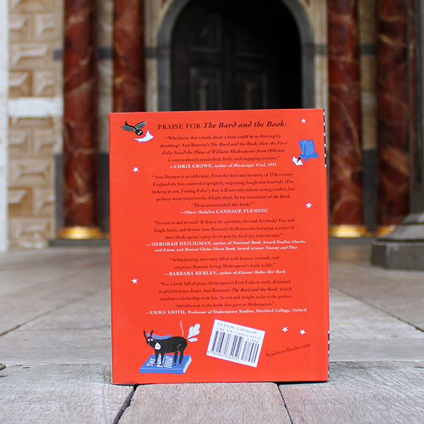 
                      
                        Blue and red hardback book with cartoon Shakespeare and animals and white and pale blue text
                      
                    