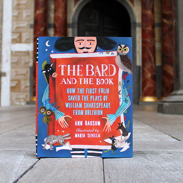 
                      
                        Blue and red hardback book with cartoon Shakespeare and animals and white and pale blue text
                      
                    