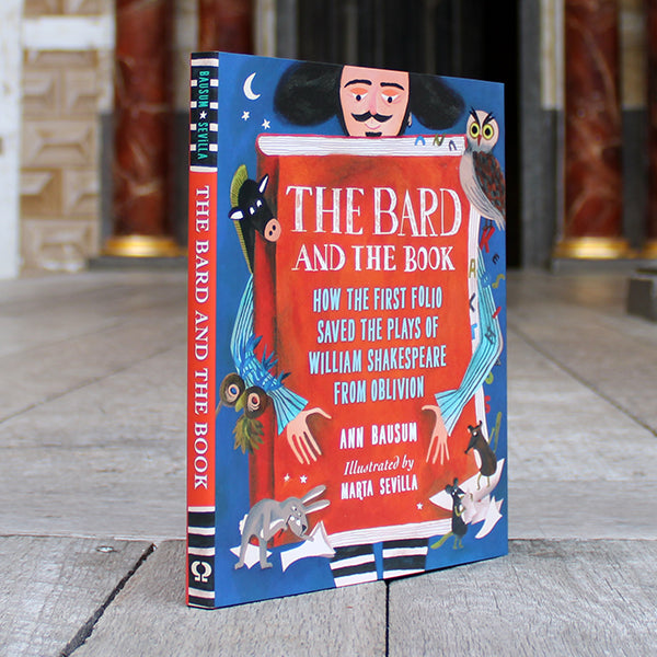 Blue and red hardback book with cartoon Shakespeare and animals and white and pale blue text
