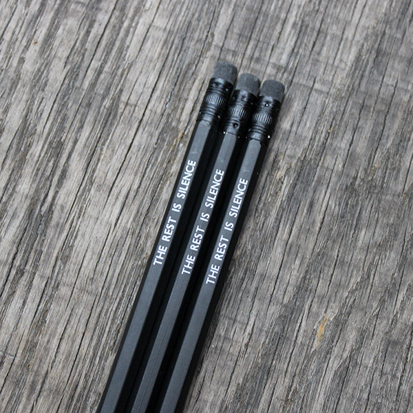 Matt black pencil with matching eraser, stamped with white text
