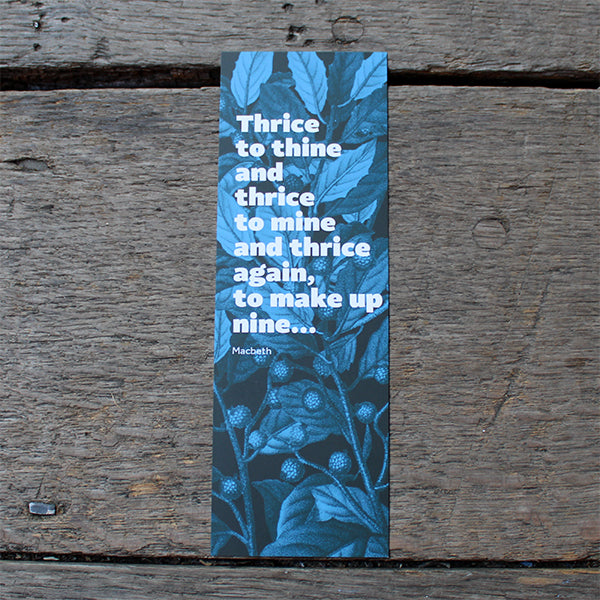 Royal blue bookmark with leaves and white text