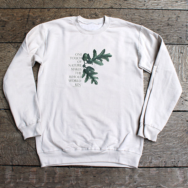 Beige polycotton sweatshirt with central forest green quote and acorn leaf graphic