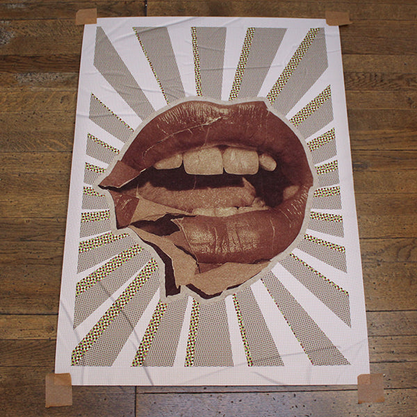 Artistic depiction of lips with geometric patterns on a wooden surface