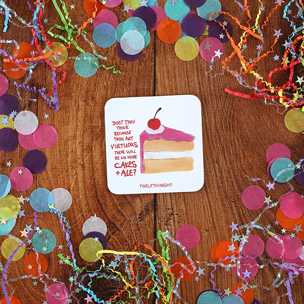 
                  
                    White square coaster with rounded corners, image of beige cake with pink frosting and red cherry on top, pink graphic text down the left side with confetti scattered around
                  
                