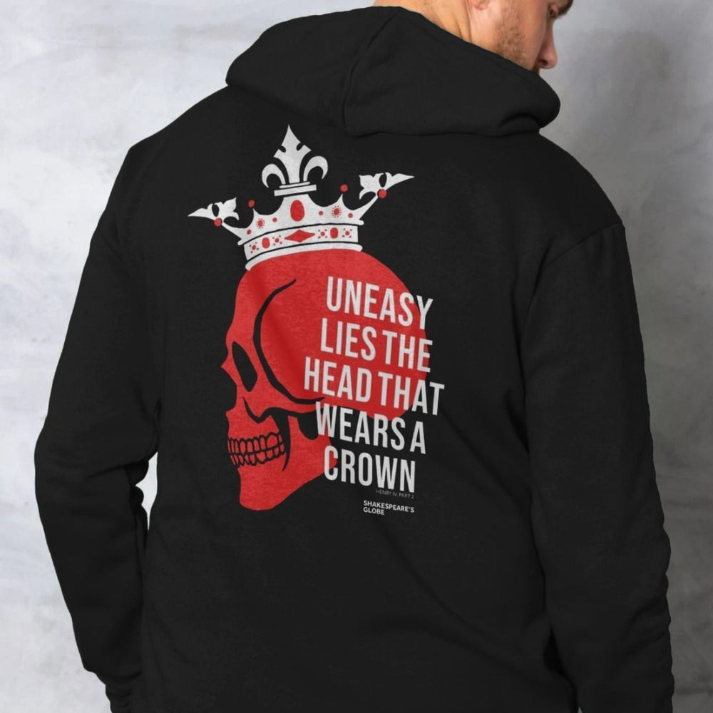 Black hoodie with red and white centred  print featuring a red skull wearing a white crown, overlayed with white text across the back