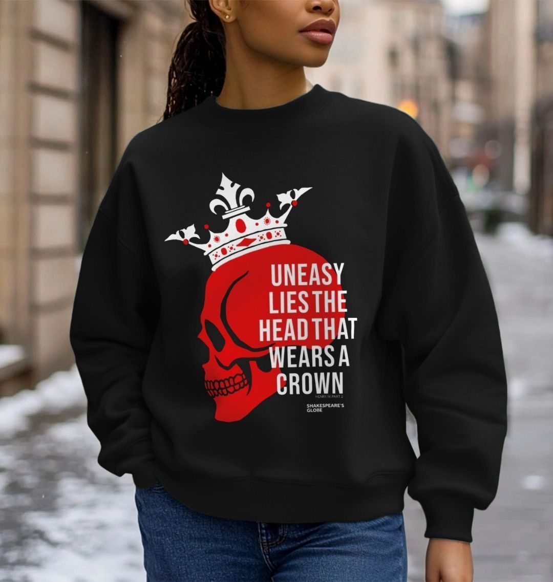 Black sweatshirt with red and white centre front print featuring a red skull wearing a white crown, overlayed with white text