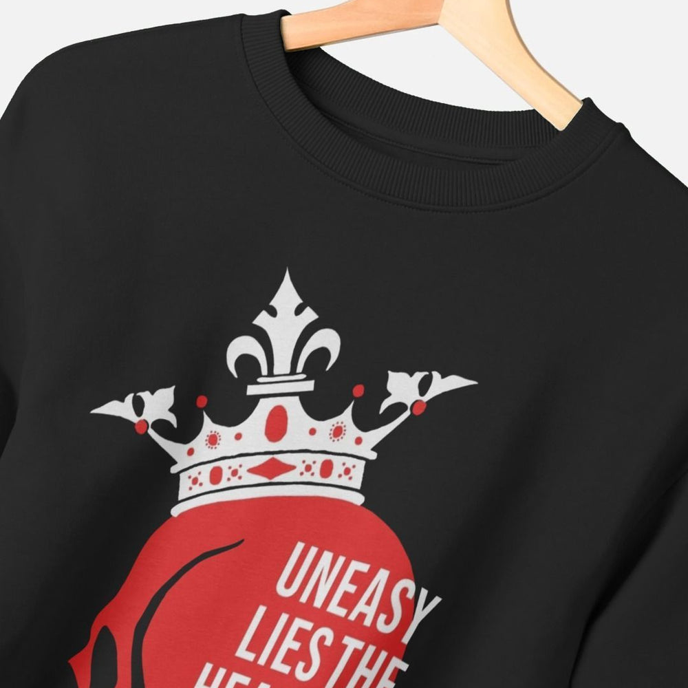 Black sweatshirt with red and white centre front print featuring a red skull wearing a white crown, overlayed with white text