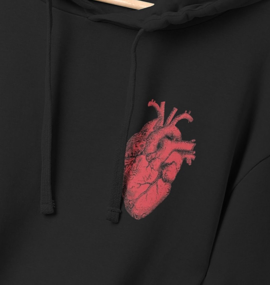 Black hoodie back with small red anatomical heart graphic on upper left chest