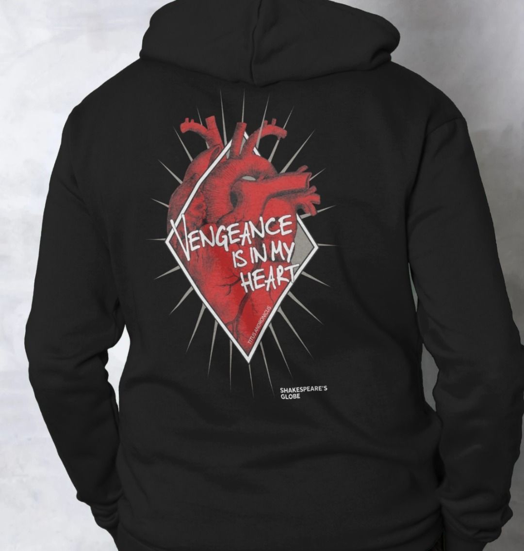 Black hoodie back with red anatomical heart graphic on centre, covered in white text