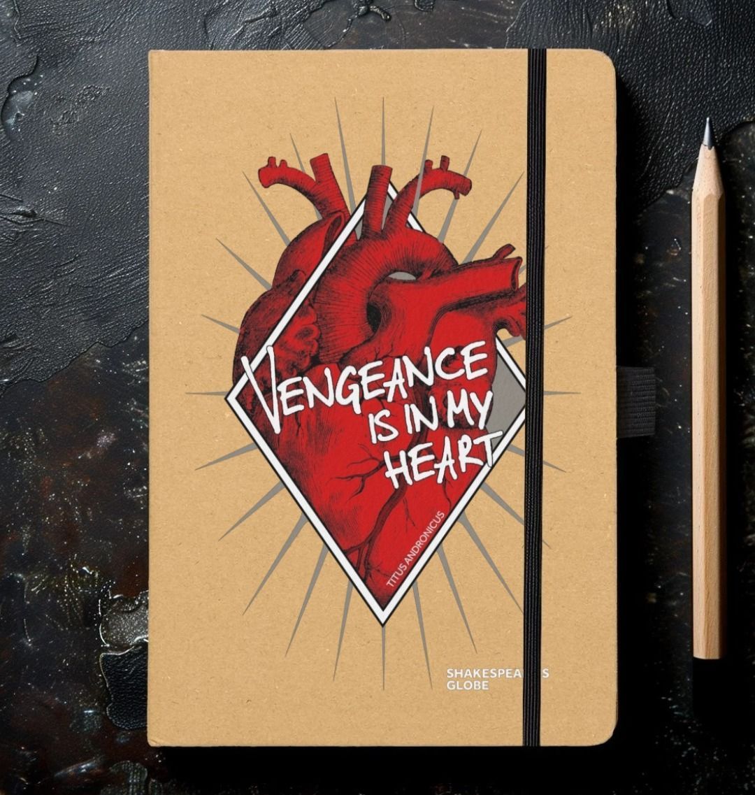 Kraft notebook with red anatomical heart graphic on front, covered in white text, black elastic closure on the side