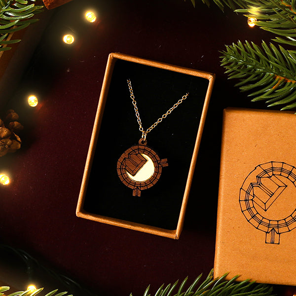 walnut wooden pendant of the Globe Theatre in a gift box