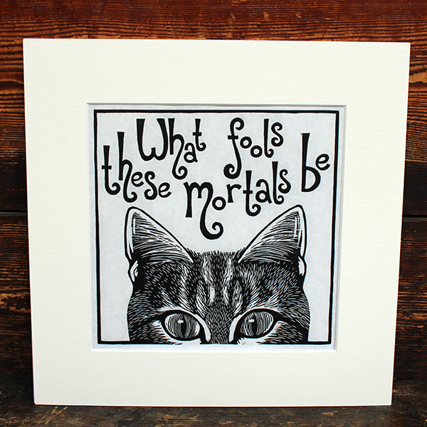 White print with matching mount, black graphic of cat from eyes up with text above