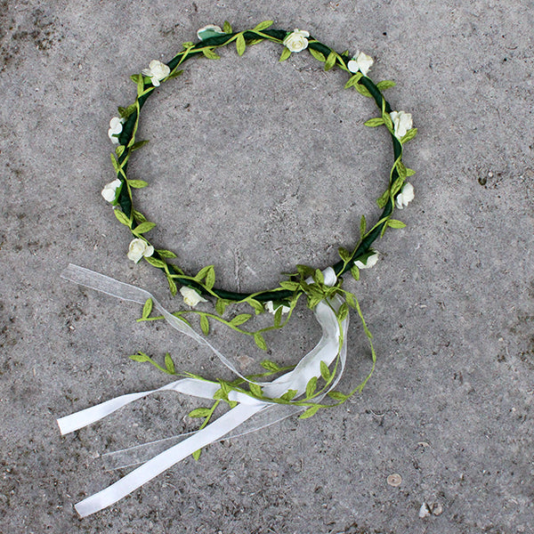 
                  
                    Faux flower, flower crown with greenery and white flowers and ribbons
                  
                