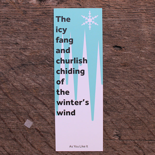 Hard card bookmark  with icy blue art deco style image with bold black text overtop