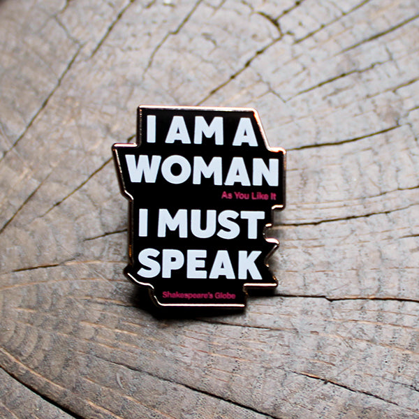Pin with text 'I AM A WOMAN As You Like It I MUST SPEAK Shakespeare's Globe' on a wooden surface
