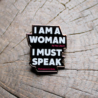 Pin with text 'I AM A WOMAN As You Like It I MUST SPEAK Shakespeare's Globe' on a wooden surface