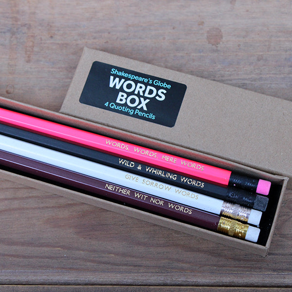 Natural card box with black sticker, with 4 pencils, maroon, white, black and pink, stamped with text