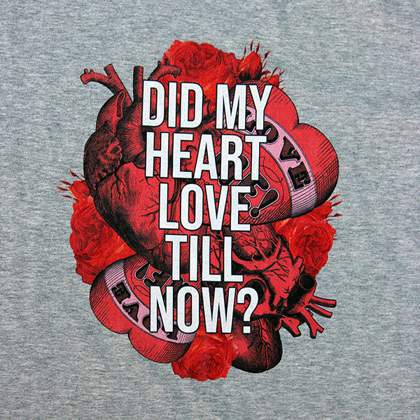 
                  
                    Heathered grey unisex t-shirt with red graphic heart with white text quoting 'Did my heart love till now?'
                  
                