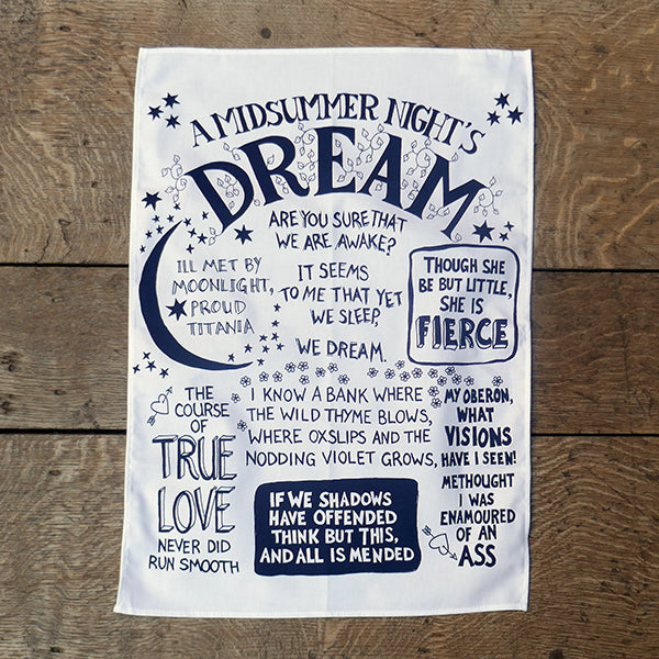 White cotton tea towel, portrait orientation, with royal blue graphic text and images