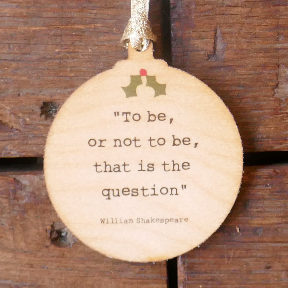 
                      
                        Round wooden Christmas decoration with engraved Shakespeare quote
                      
                    