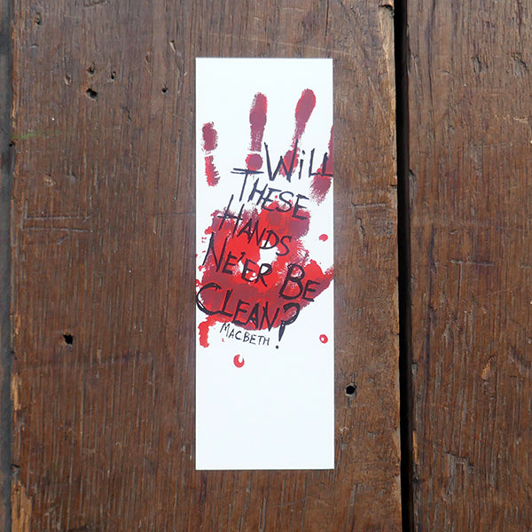 Large white card bookmark with an image of a bloody handprint. Over the hand print is a quote from Shakespeare play, Macbeth, printed in black hand-drawn lettering