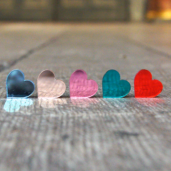 Brightly coloured acrylic heart shaped stud earrings from Shakespeare's Globe.