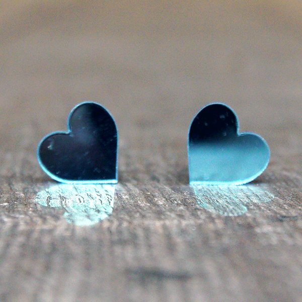 Heart shaped stud earrings made from ice blue, mirrored acrylic.