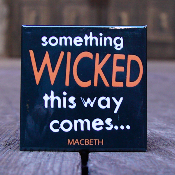 Black square magnet with white and orange text ' something wicked this way comes'