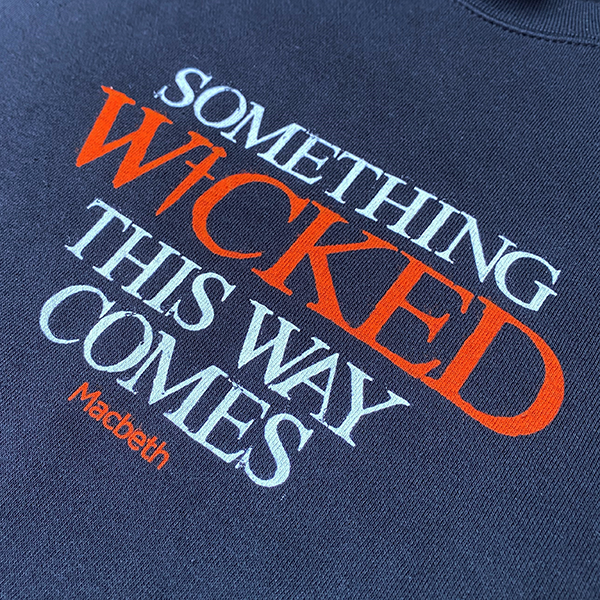 
                  
                    Black cotton sweatshirt with white graphic font across the centre front and 'Wicked' text in orange
                  
                