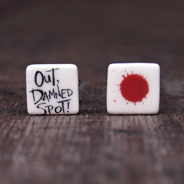 
                      
                        Ceramic cufflinks featuring a quote from Lady Macbeth on one (Out, damned spot!) and a blood spot on the other
                      
                    