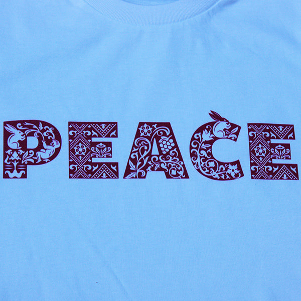 
                  
                    White cotton unisex tshirt with bold red writing across chest depicting PEACE
                  
                