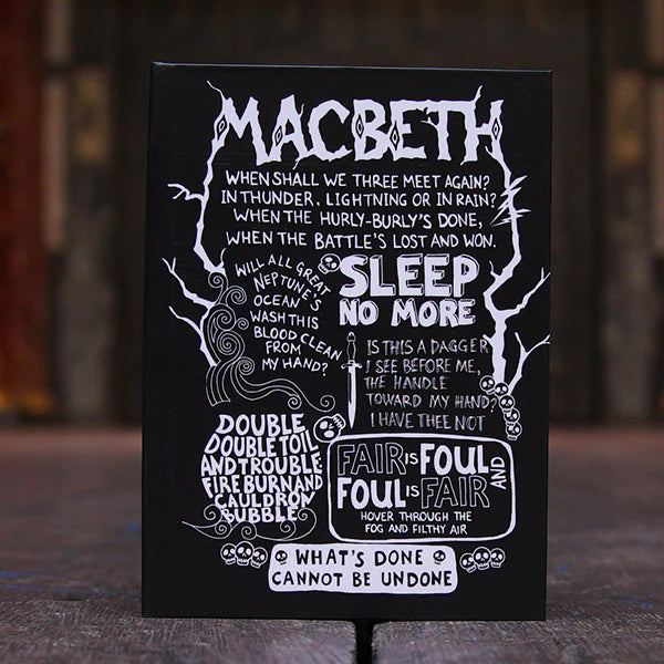 Black A6 sized hardback journal printed with well known quotes from Shakespeare play, Macbeth, in white hand-drawn lettering