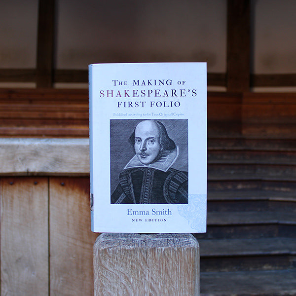 Hardback book with white jacket sleeve featuring black and white image of William Shakespeare on centre front.
