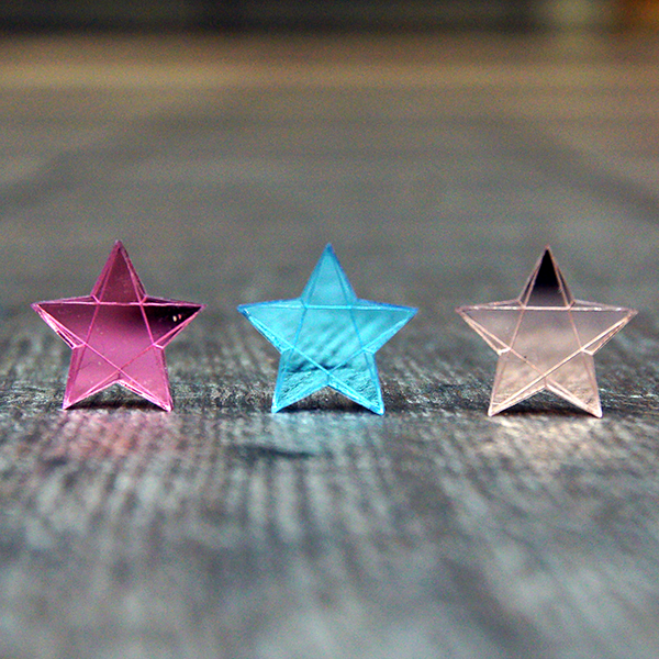 Star shaped earrings made from pastel mirrored acrylic