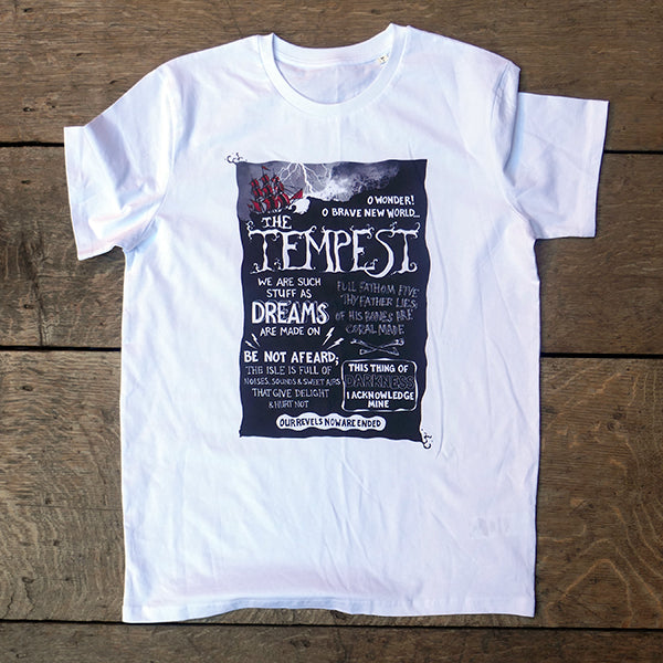 White short sleeve, round neck, cotton t-shirt with a large chest print celebrating Shakespeare play, The Tempest. A black story sea with an old fashioned sailing ship with red sails struggling amid the waves. In white hand-drawn lettering are various well known quotes from the play