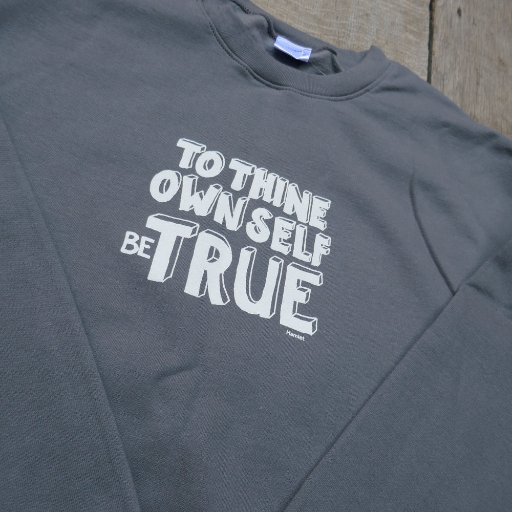 
                  
                    Grey cotton blend sweatshirt with white graphic text in centre front.
                  
                
